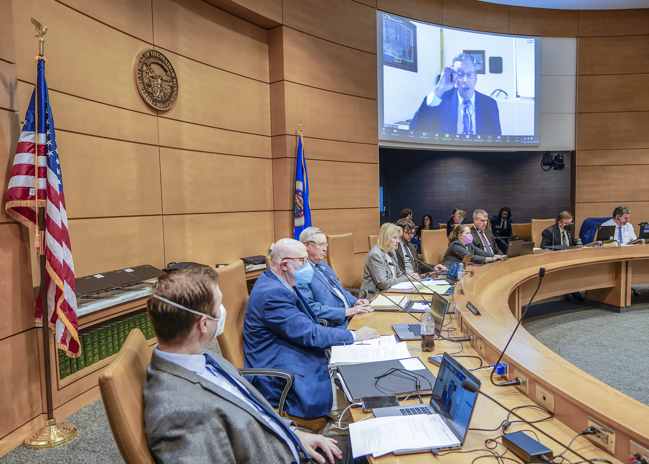 Via Zoom, Rep. Michael Nelson calls the first meeting of the omnibus state government, elections, transportation and pensions conference committee to order May 9. (Photo by Andrew VonBank)